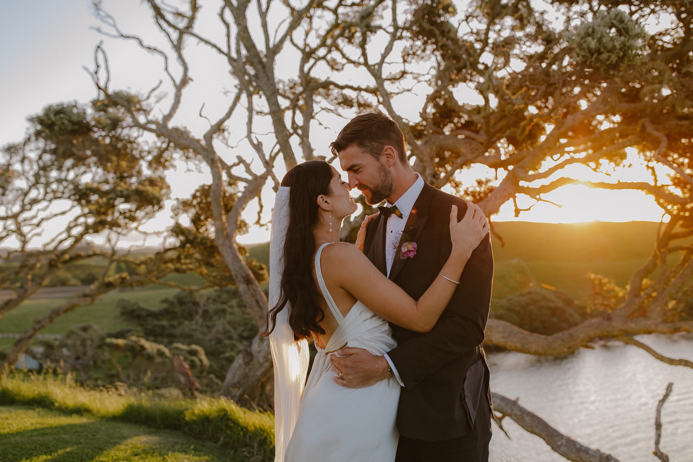 couple at sunset baylys farm wedding